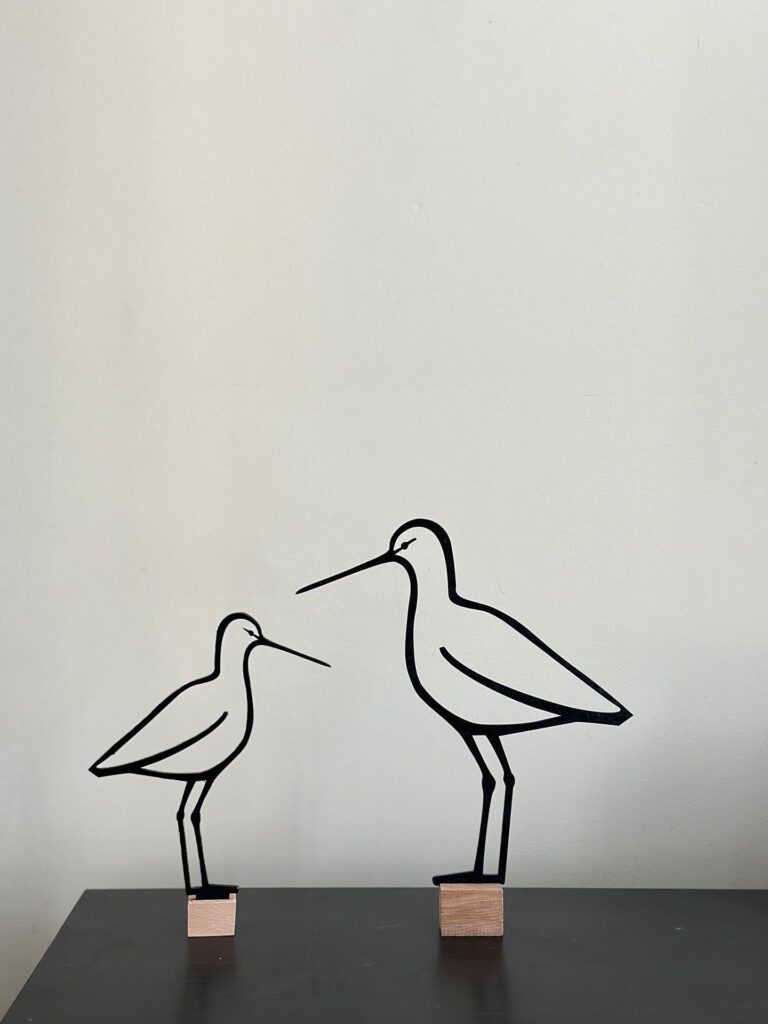 Twee reigers op tafel